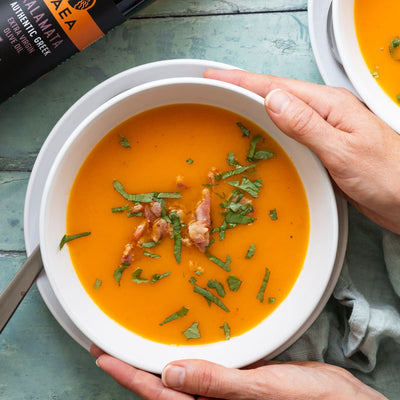Butternut squash soup topped with bacon